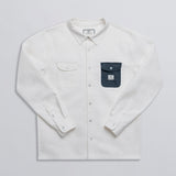 White denim over shirt with contrasting dark blue denim pocket.