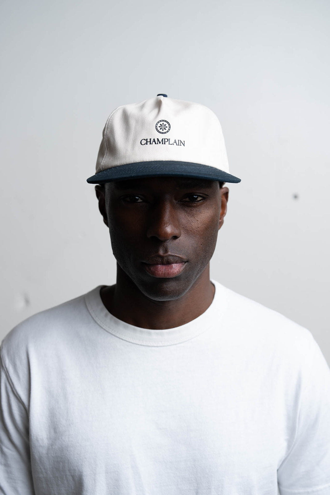 Cream on Navy Hat