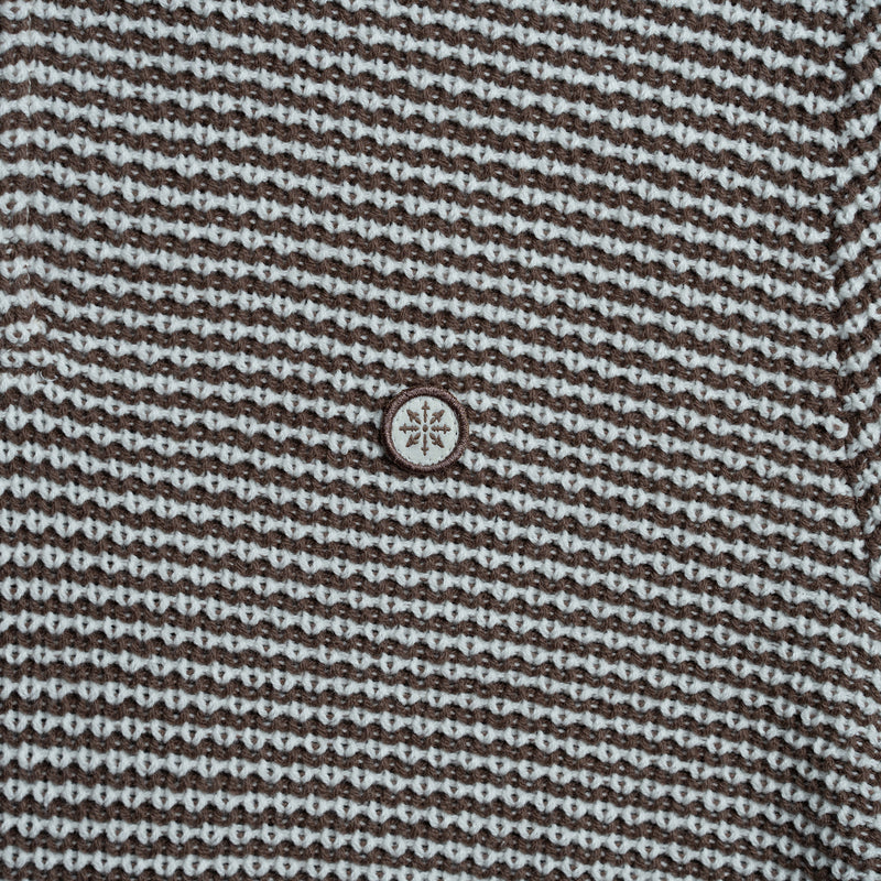 Close up of knit rugby shirt.